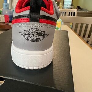 Jordan 1 Low Alt Black and Cement Gray